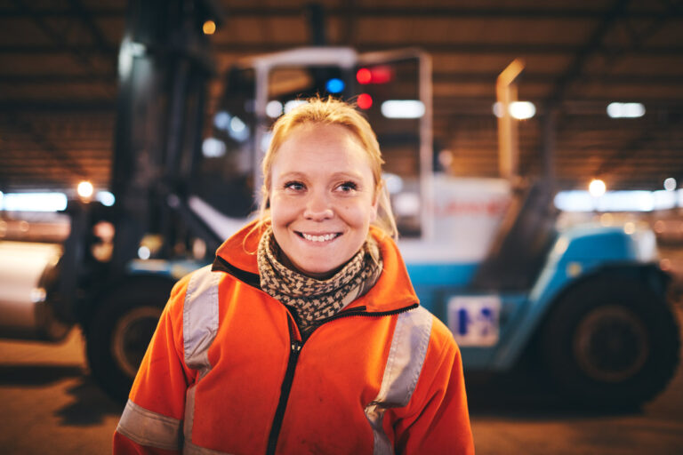 Picture of a smiling girl working in Port of Helsingborg